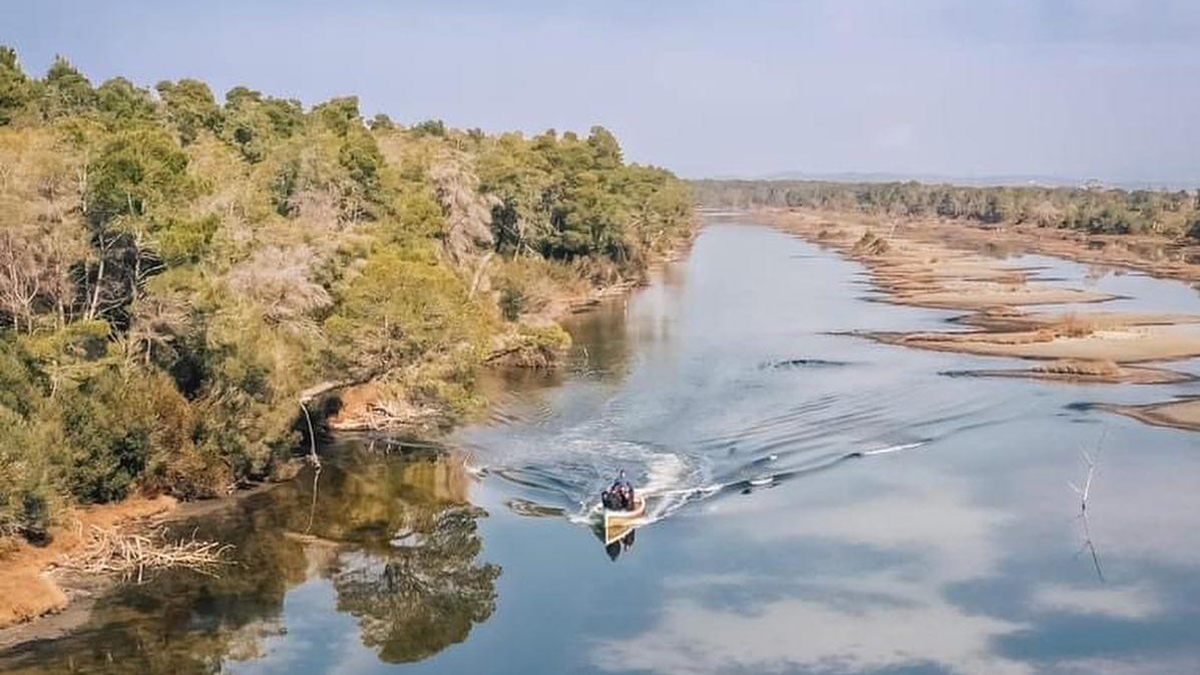 Boat on a river in one oft the protected areas of Albania